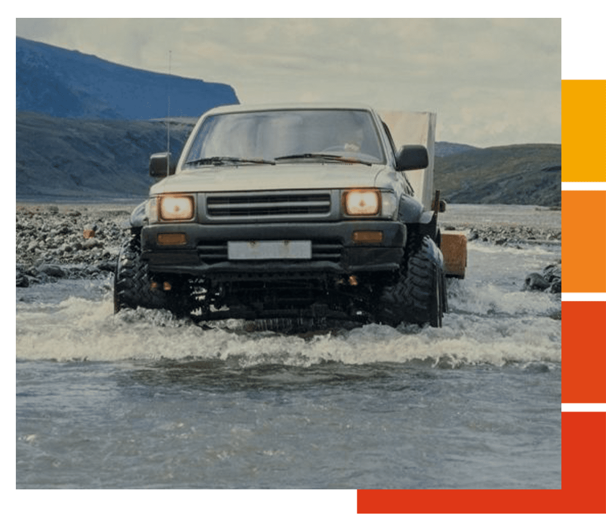 Toyota truck driving through river